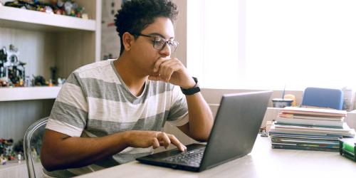 student using a laptop computer